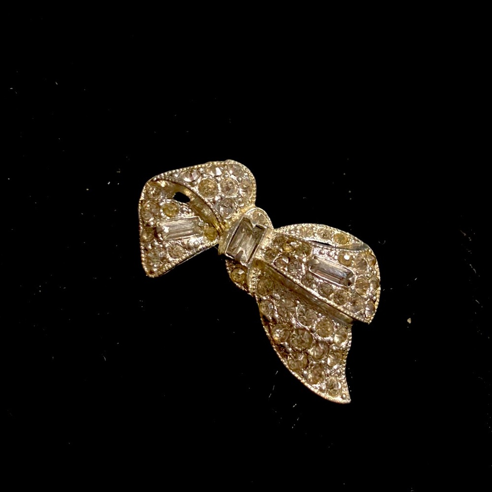 Vintage white metal rhinestone asymmetrical bow pin brooch